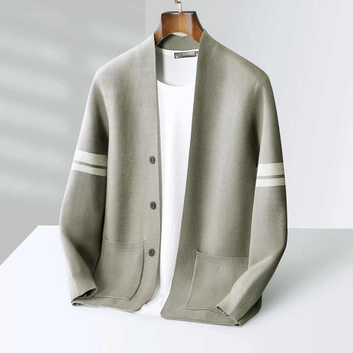 Man enjoying outdoor casual wear in a lightweight men's striped cardigan, blending modern style and comfort.