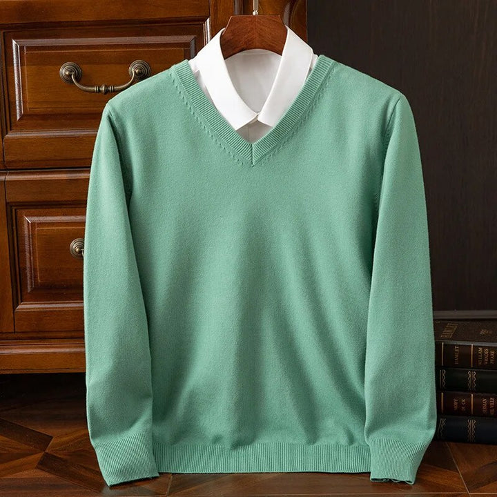 Men's Olympia V-neck sweater, soft grey knit. Ideal for everyday casual wear, offering comfort and style.