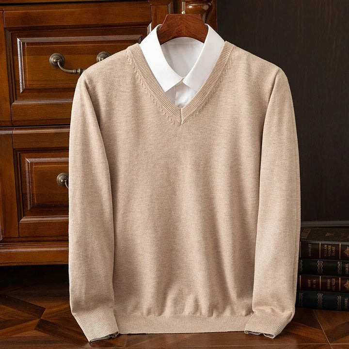 Everyday comfort in a men's stylish V-neck sweater. Soft, long-sleeve pullover for a relaxed look.