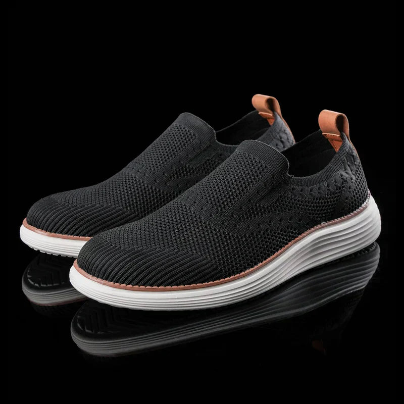 Stylish men's athletic slip-on sneakers with enhanced orthopedic arch support for casual & daily wear.