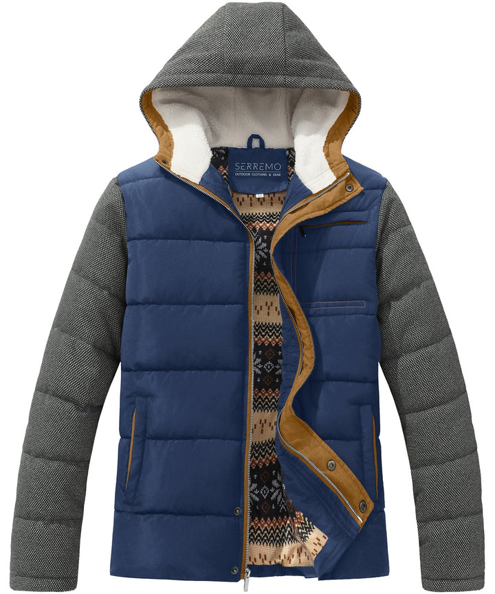 Man wearing a blue men's outdoor puffer jacket, hiking in a snowy landscape, warm
