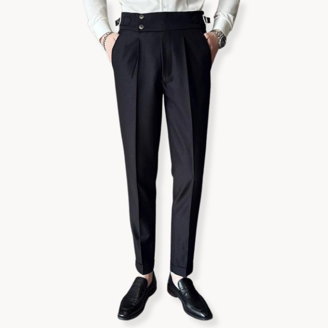 Close-up of adjustable waist and pleats on men's Gurkha dress trousers. Sophisticated formal wear detail.