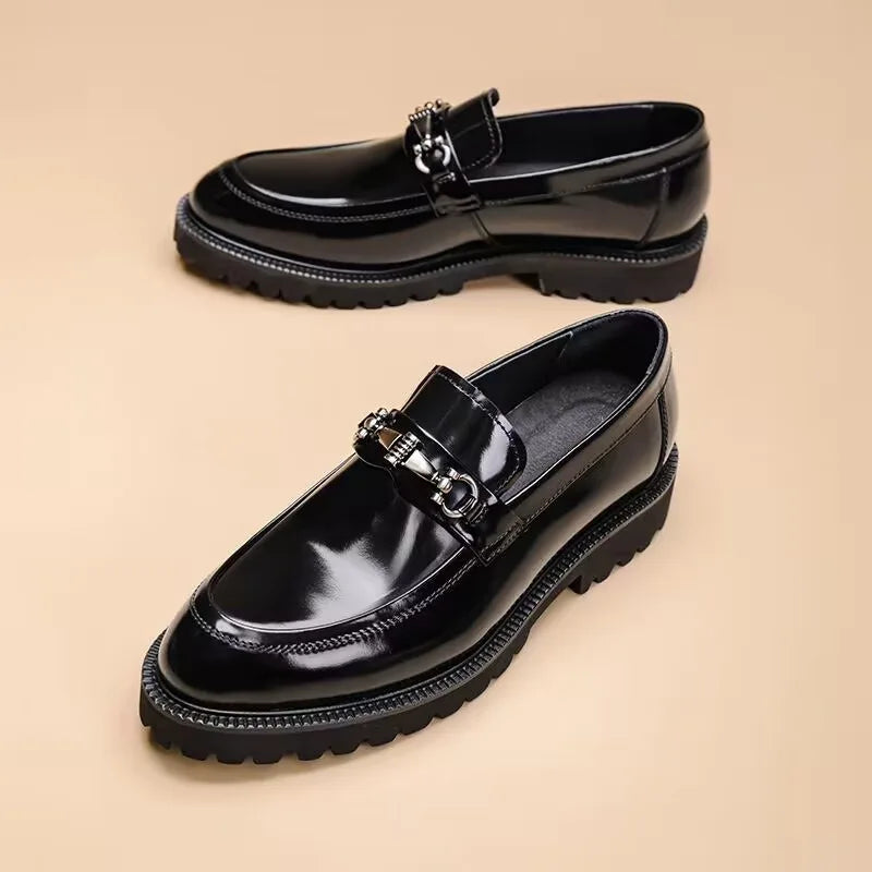 Men's polished black loafers, perfect for the office or formal events. Classic slip-on dress shoes with metal bit.