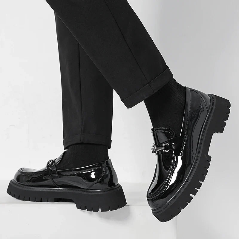 Elegant men's polished dress loafers, ideal professional footwear for formal events and ceremonies.