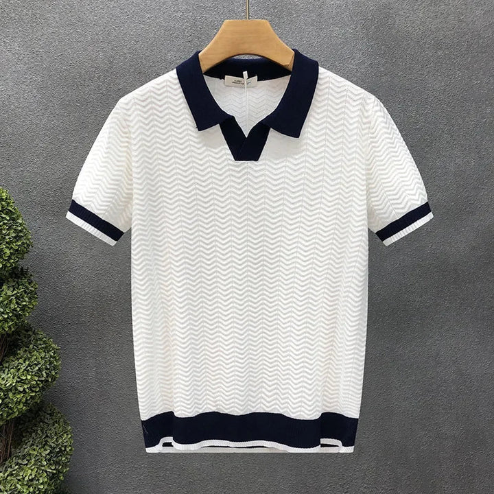 Textured knit men's polo shirt, premium cotton, featuring a stylish contrast trim. A versatile casual summer top.