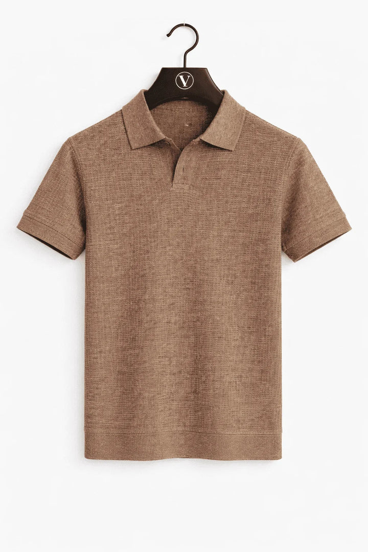 Man in stylish premium men's pique polo shirt, perfect for a smart casual outfit.