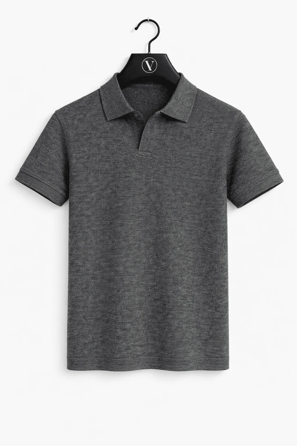 Close-up of premium pique fabric on a men's tailored fit polo shirt, highlighting texture.
