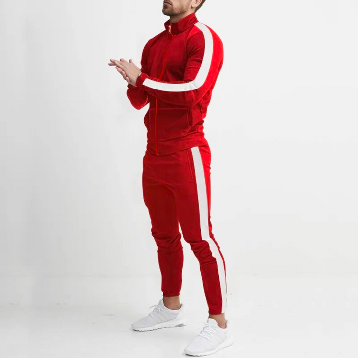 Model wearing a men's black polyester tracksuit, perfect casual jogging set for modern athleisure style