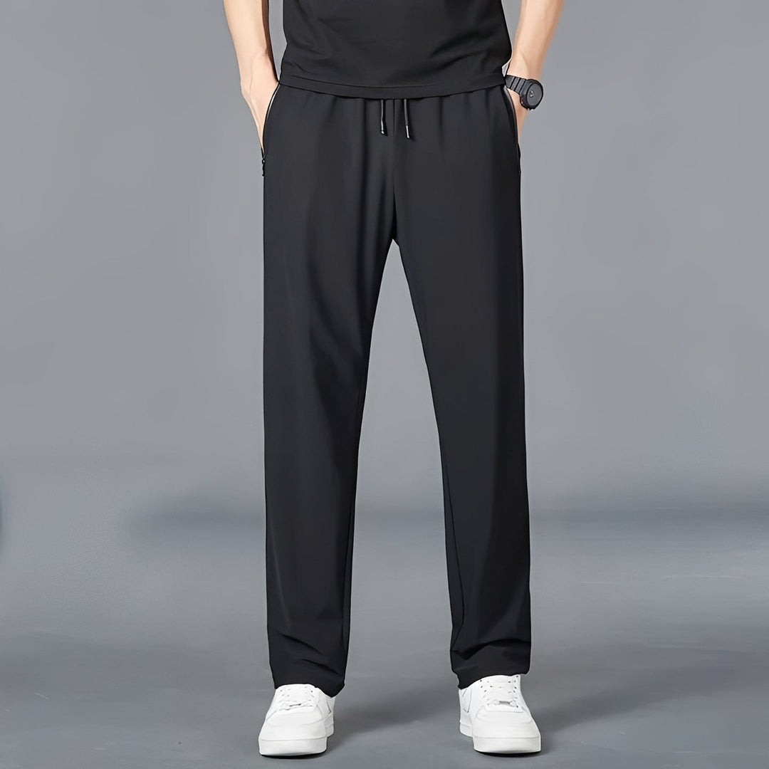 Close-up of durable men's quick-dry stretch fabric hiking pants with cargo pockets for outdoor travel.