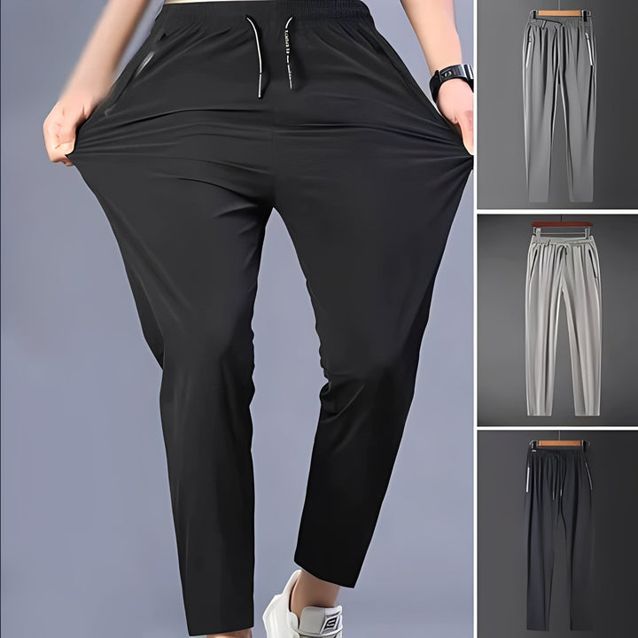 Men's quick-dry stretch hiking cargo pants on a model, showcasing features for outdoor and travel activities.