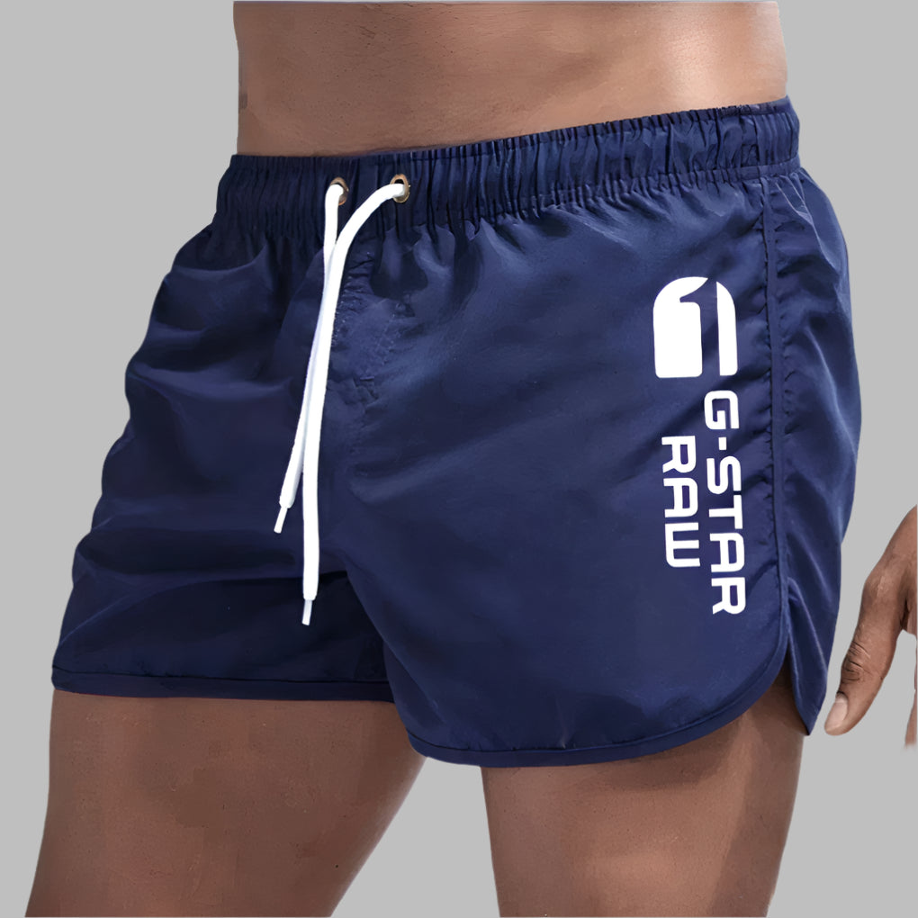 Versatile men's quick dry beach shorts, also suitable as swim trunks or athletic pool wear. Summer fashion.