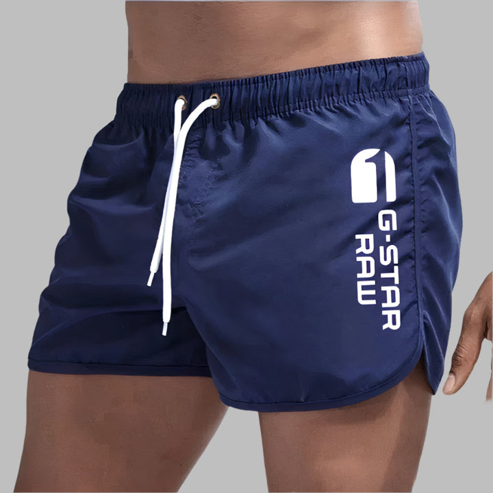 Versatile men's quick dry beach shorts, also suitable as swim trunks or athletic pool wear. Summer fashion.
