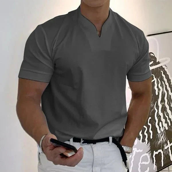 Close-up of moisture-wicking fabric on a men's quick-dry V-neck t-shirt. Performance wear for summer comfort.