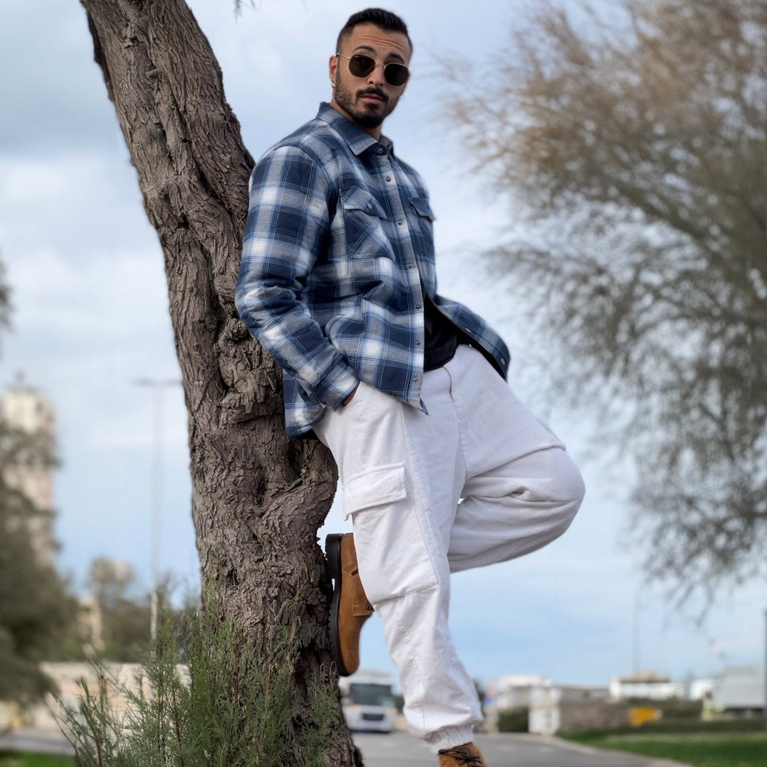 Casual men's apparel: Quilted flannel jacket in a timeless black and white plaid