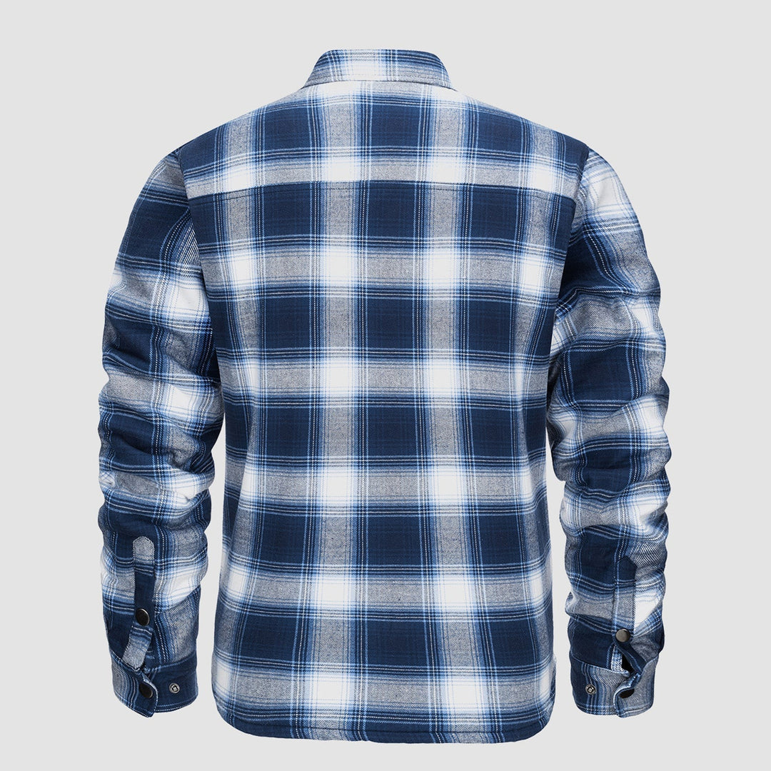 A stack of men's quilted flannel jackets in various colors, showcasing fall fashion choices