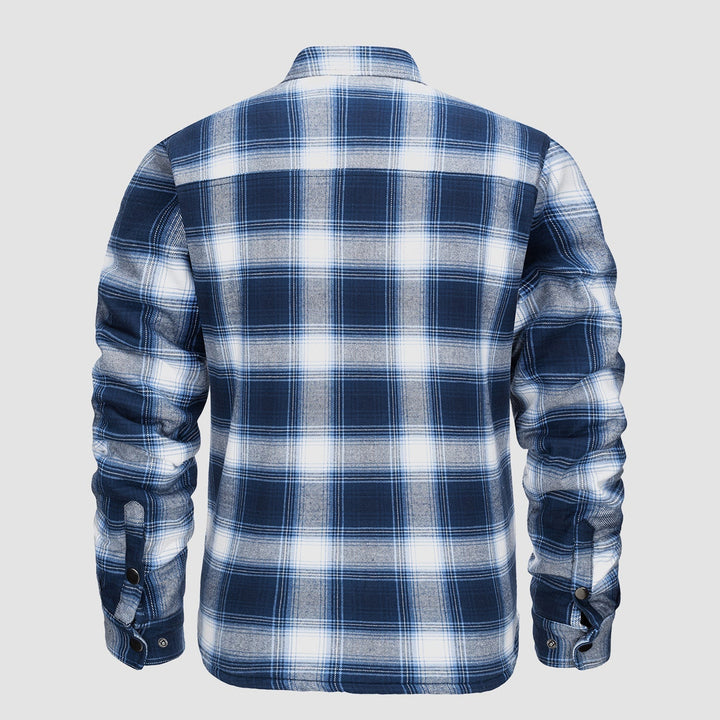 A stack of men's quilted flannel jackets in various colors, showcasing fall fashion choices