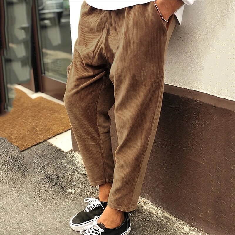 Men's relaxed fit black corduroy trousers, front view, perfect for casual wear & comfort