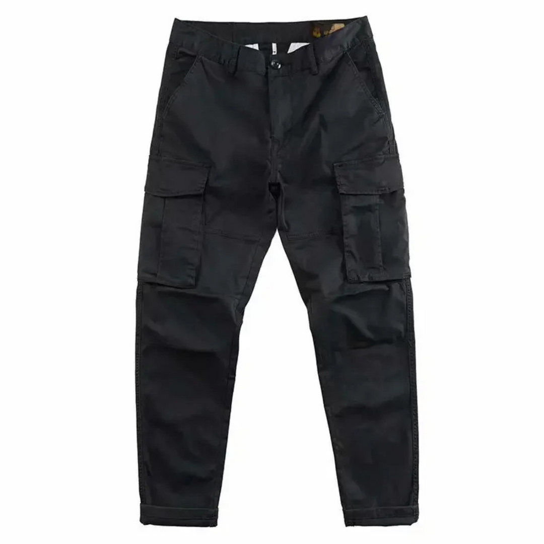 Men's relaxed fit cargo pants in khaki, showing multiple utility pockets and comfortable fabric.