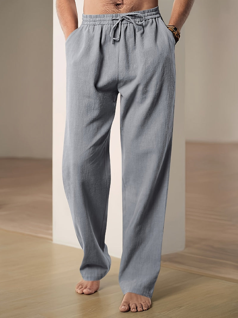 Stylish men's relaxed fit drawstring pants, ideal for modern casual fashion and comfortable loungewear.