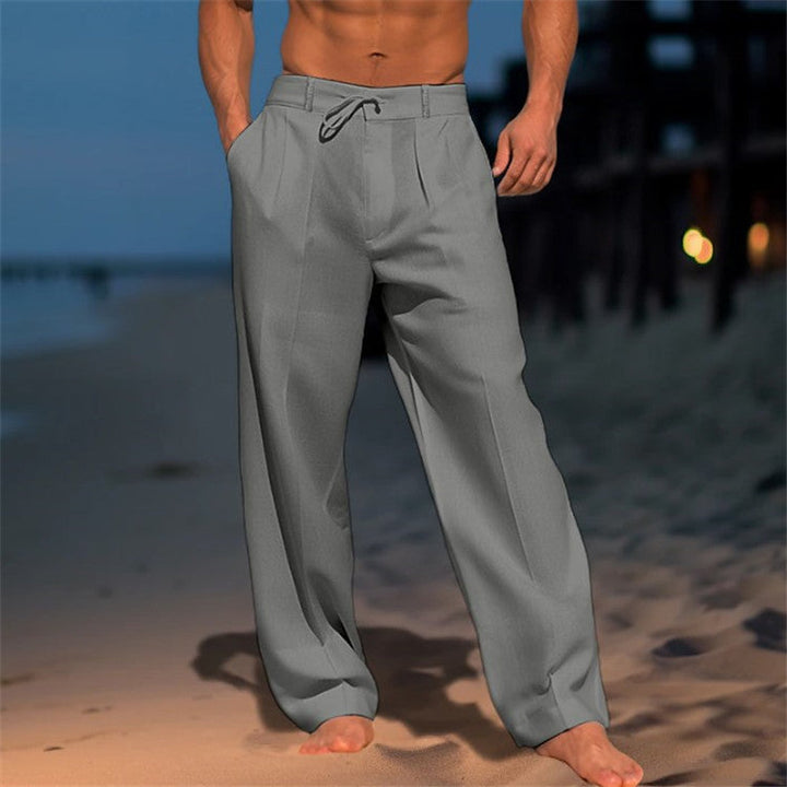 Close-up of the drawstring waistband on men's relaxed spring trousers for casual wear