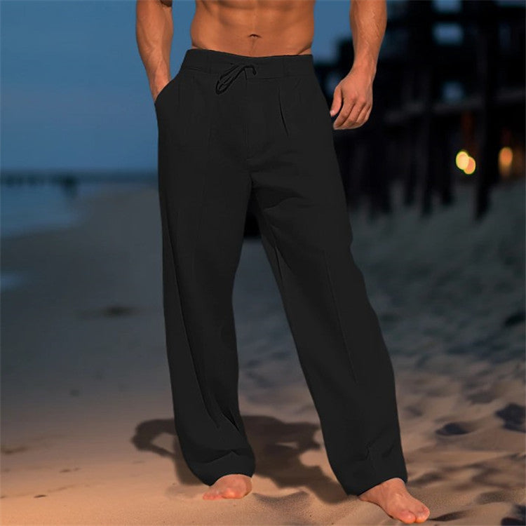 Model wearing men's relaxed drawstring trousers, showcasing the comfortable and casual spring style