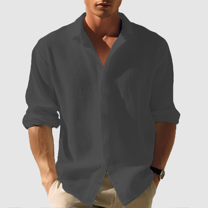 Casual men's long sleeve button-down shirt in a relaxed fit, delivering stylish comfort for summer.