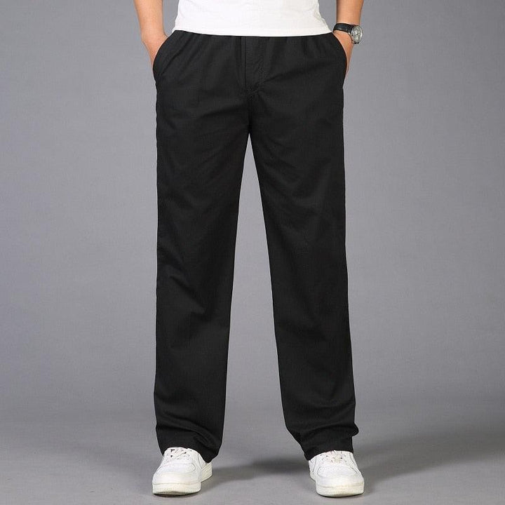 Black straight leg men's casual pull-on trousers for daily wear.
