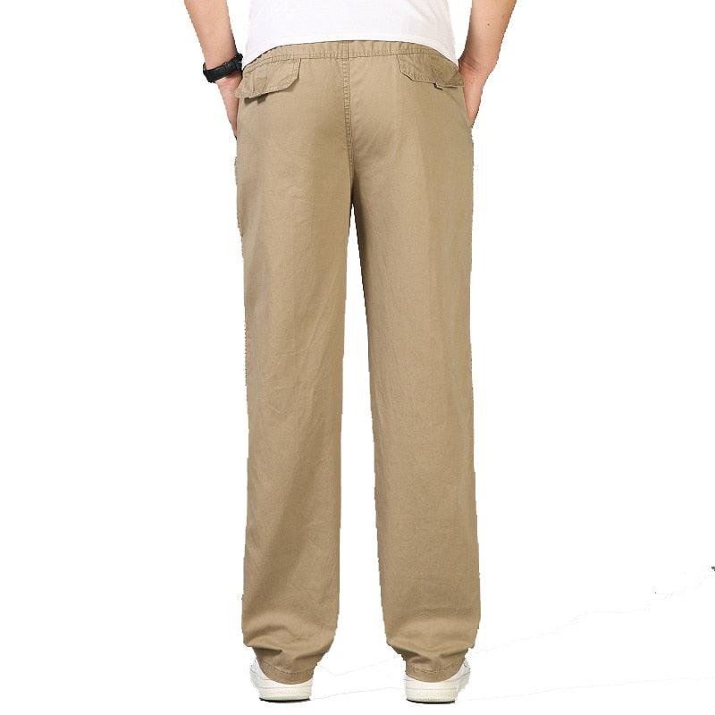 Khaki men's relaxed fit pull-on pants, straight leg, elastic waist, casual.