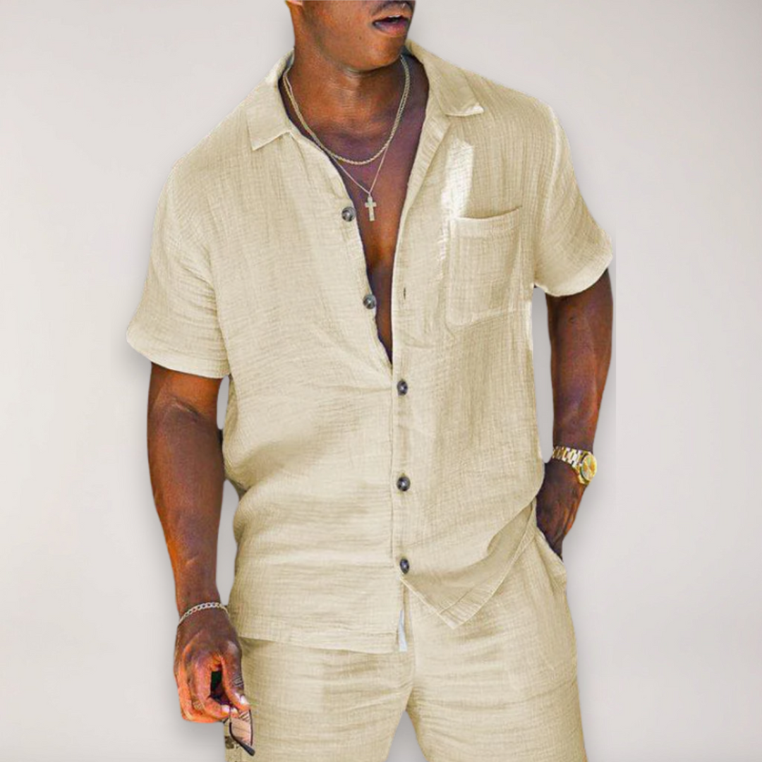 Casual men's summer two-piece set featuring a relaxed fit short sleeve shirt and matching shorts, ideal for vacation.