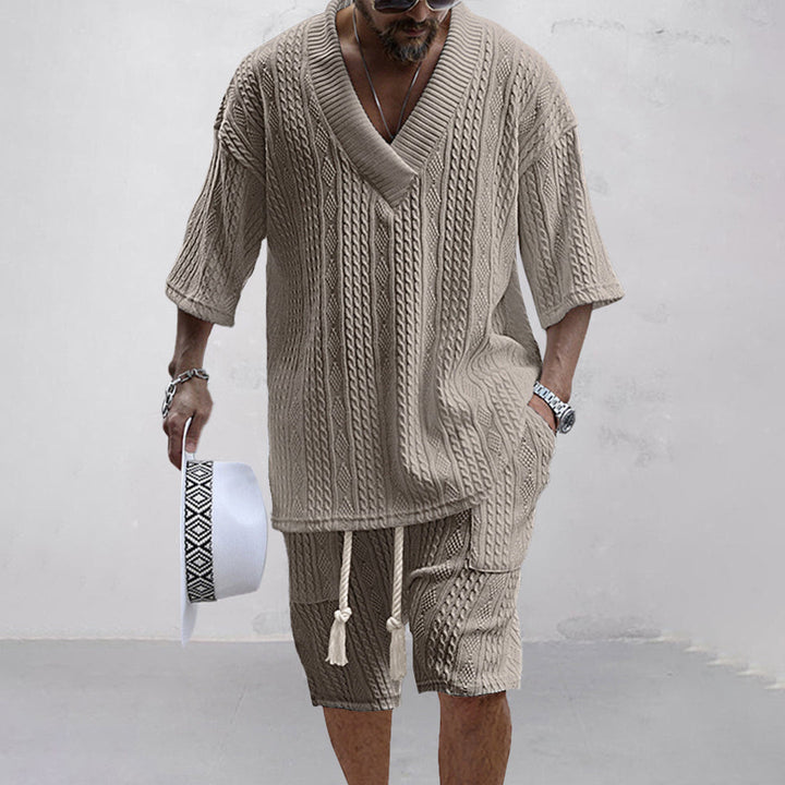 Men's relaxed fit V-neck shirt and shorts lounge set. Versatile two-piece casual wear for daily comfort.