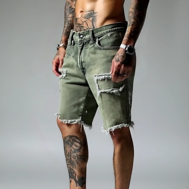 Stylish men's pink ripped stretch denim shorts, distressed casual wear for a trendy summer look.
