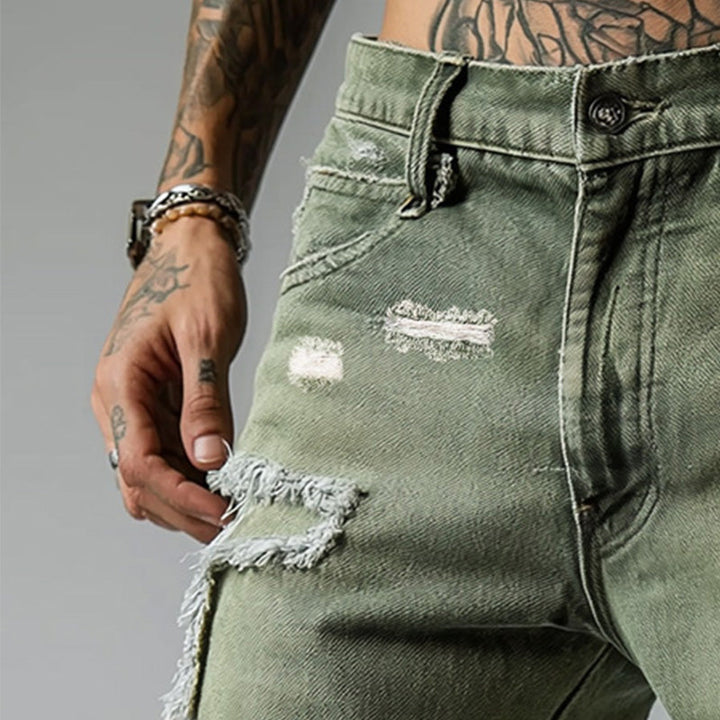 Black men's ripped stretch denim shorts, distressed and comfortable for casual summer fashion.