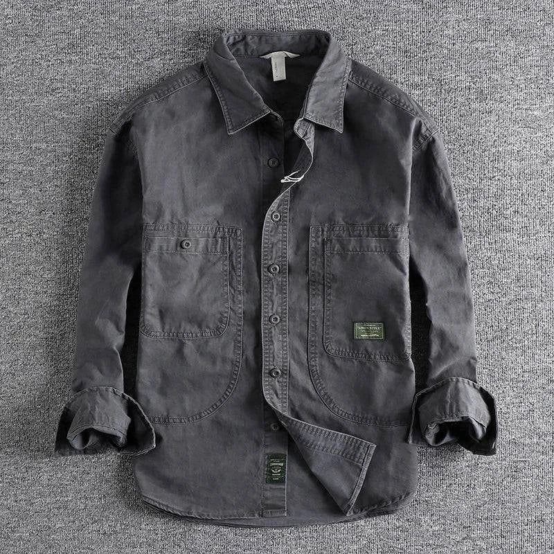 Man wearing rugged Taupe men's field shirt, a durable button-down for versatile casual and outdoor style.
