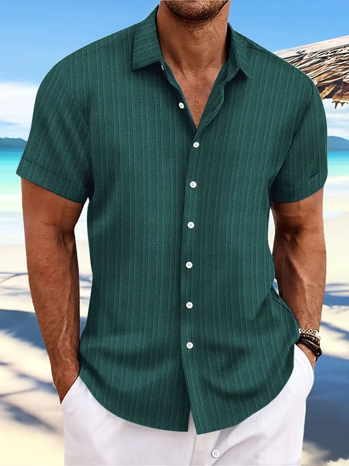Casual men's short sleeve button down shirt. Breathable collared top with a relaxed fit for men.