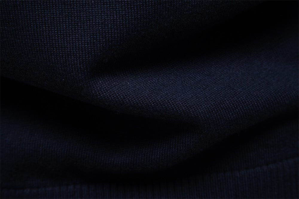 lifestyle shot of man relaxing in a Siena half-zip cotton blend longsleeve sweater