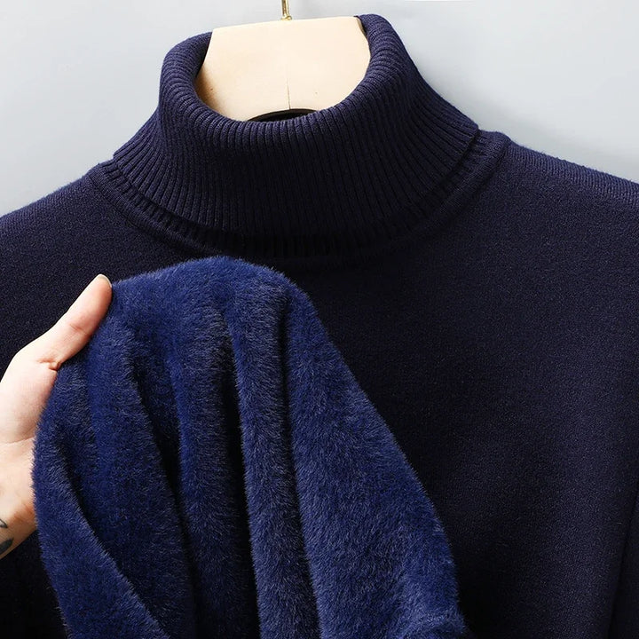 Modern men's sleek black turtleneck sweater, offering ultimate winter comfort, refined style, & warmth.