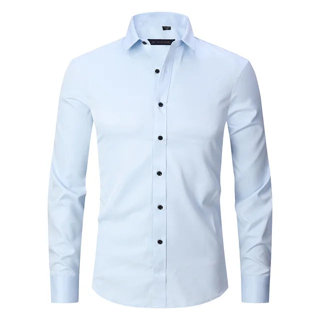 Man adjusting cuff of a modern slim-fit button-down dress shirt, front view.