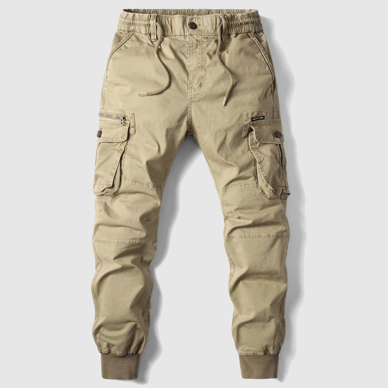 Black men's slim fit cargo joggers with multiple utility pockets, elastic cuffs, and adjustable drawstring for comfort.