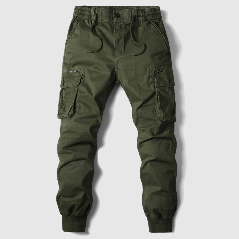 Front view of blue men's slim fit cargo joggers, showcasing utility pockets, tapered leg, and activewear style.