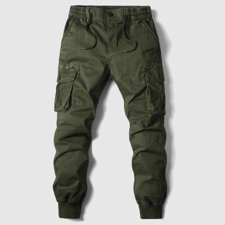 Front view of blue men's slim fit cargo joggers, showcasing utility pockets, tapered leg, and activewear style.