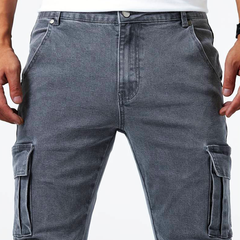 Modern men's slim fit cargo pants with multiple side flap pockets, perfect for a sleek casual style.
