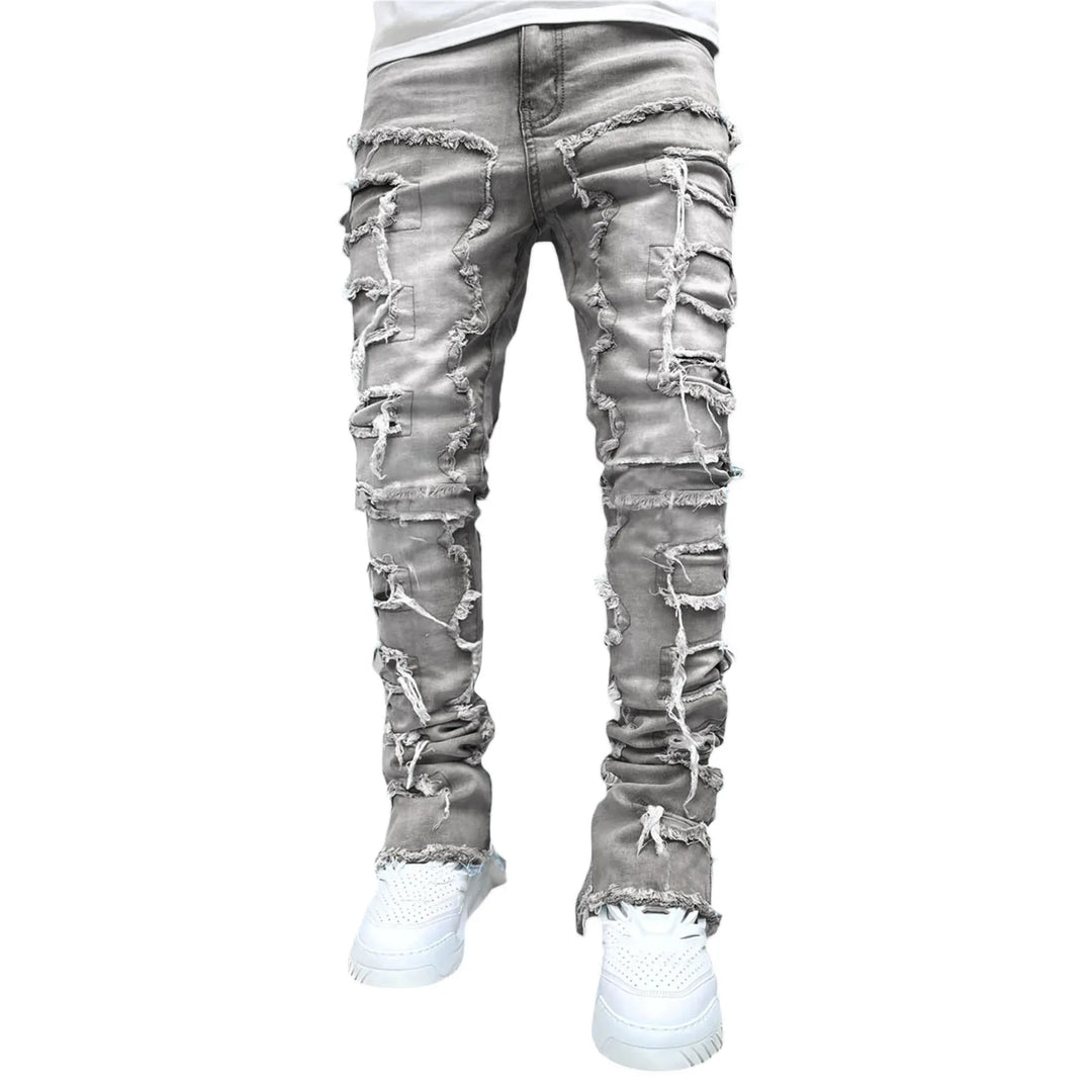 Men's slim fit distressed ripped jeans. Trendy casual pants for an urban fashion look. Perfect men's denim.