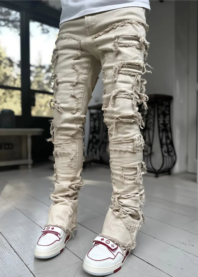 Men's urban style slim fit ripped jeans. Distressed denim pants, perfect for modern street fashion and casual wear.