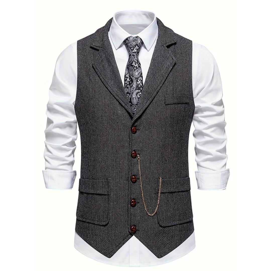 Versatile men's slim fit herringbone vest, textured for smart casual or formal layering. Menswear.