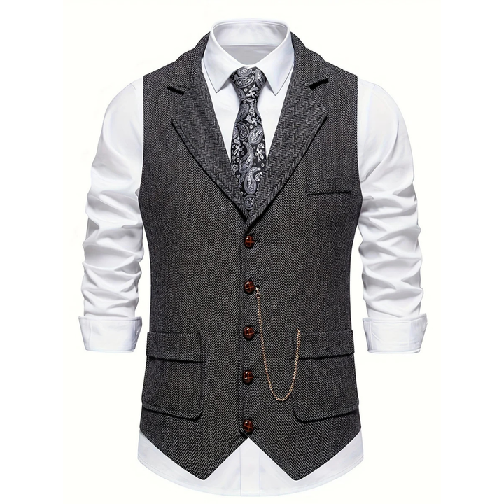 Versatile men's slim fit herringbone vest, textured for smart casual or formal layering. Menswear.