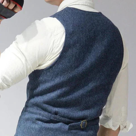 Slim fit herringbone tweed men's waistcoat. Elegant classic vest for formal, business, or wedding attire.