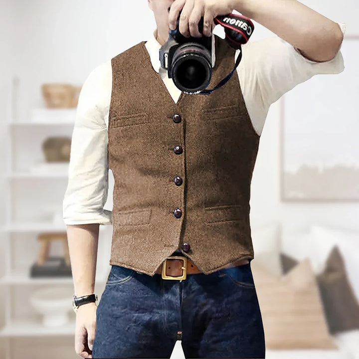 Elegant men's herringbone tweed waistcoat, slim fit for a classic, sophisticated look. Versatile formalwear.