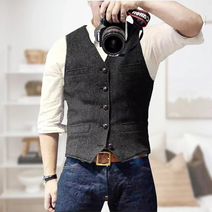 Men's slim fit herringbone tweed waistcoat. A classic men's vest for elegant formal or business fashion.