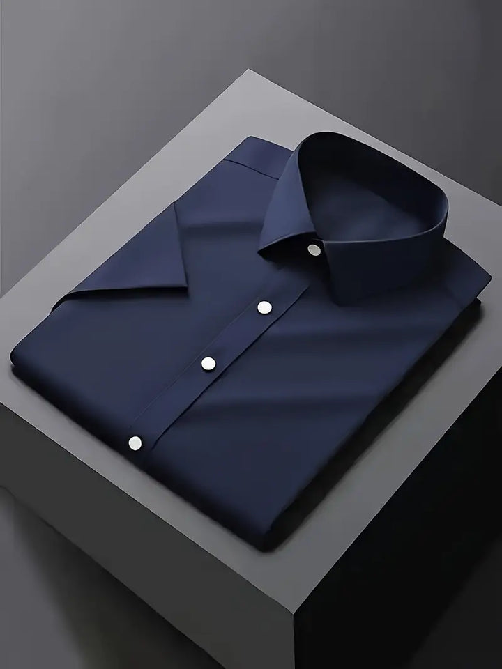 Versatile long sleeve menswear dress shirt. Classic slim fit button-down for professional & formal attire.