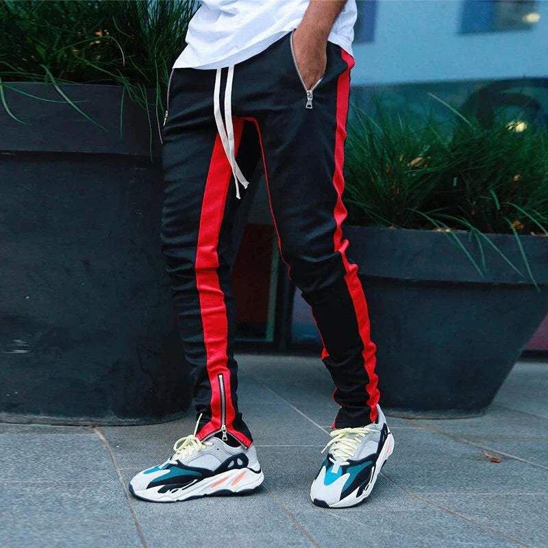 Men's athletic slim fit track pants, soft breathable fabric, practical zip hem for adjustable fit & enhanced comfort.